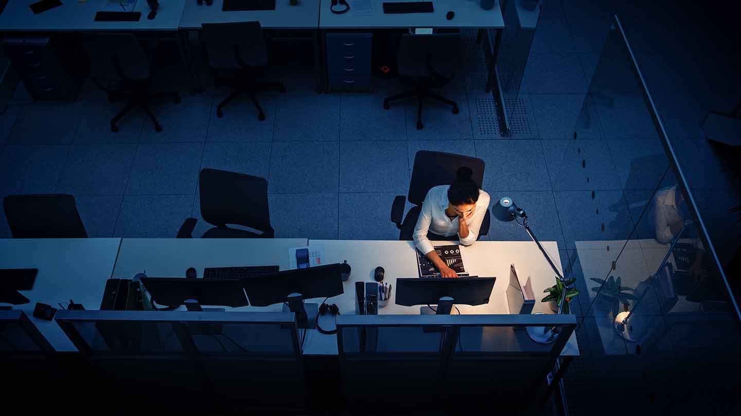 lonely-website-worker A photo of a woman working alone in a high tech office