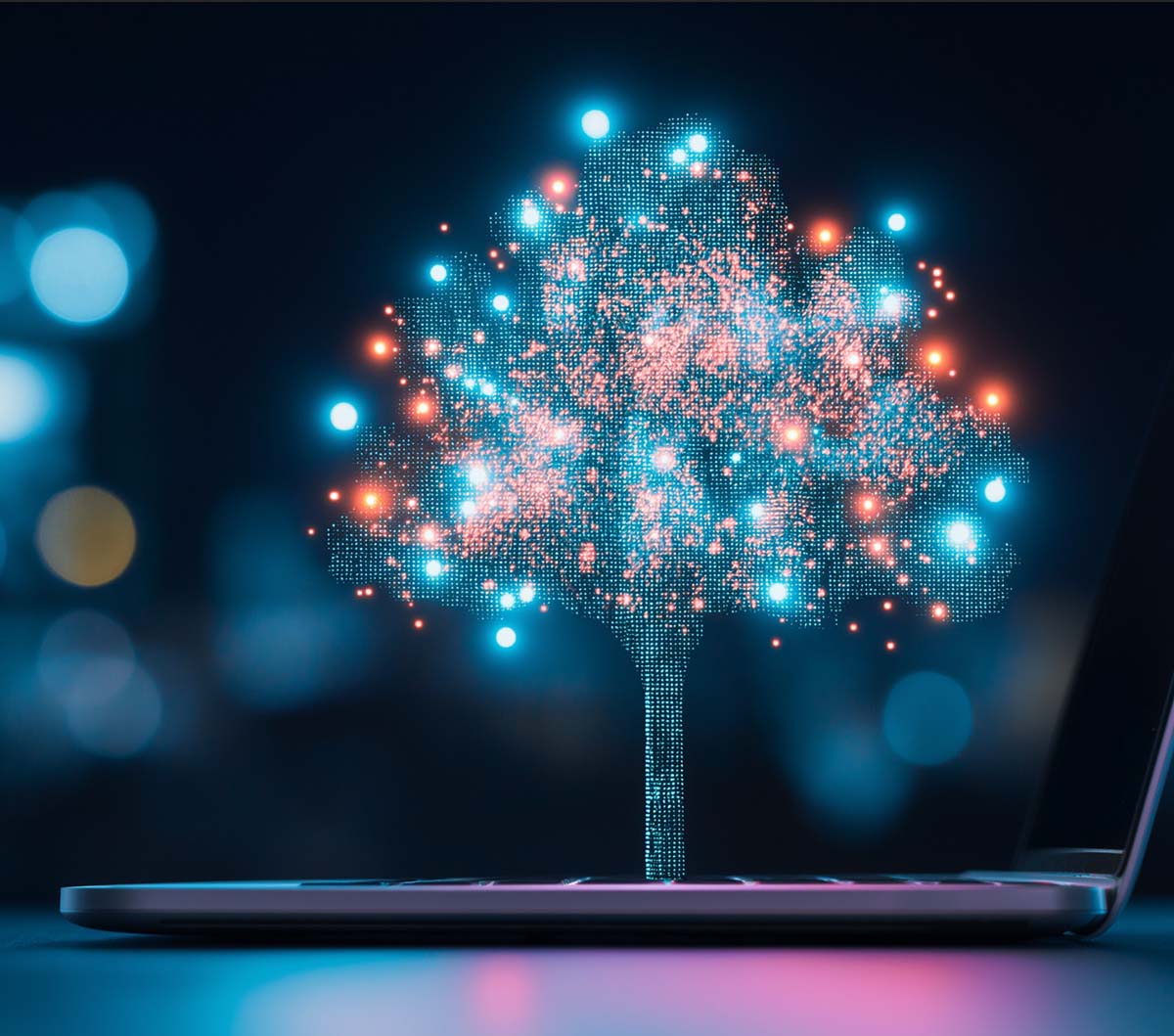 thriving_tree_laptop A thriving digital tree grows out of a laptop keyboard